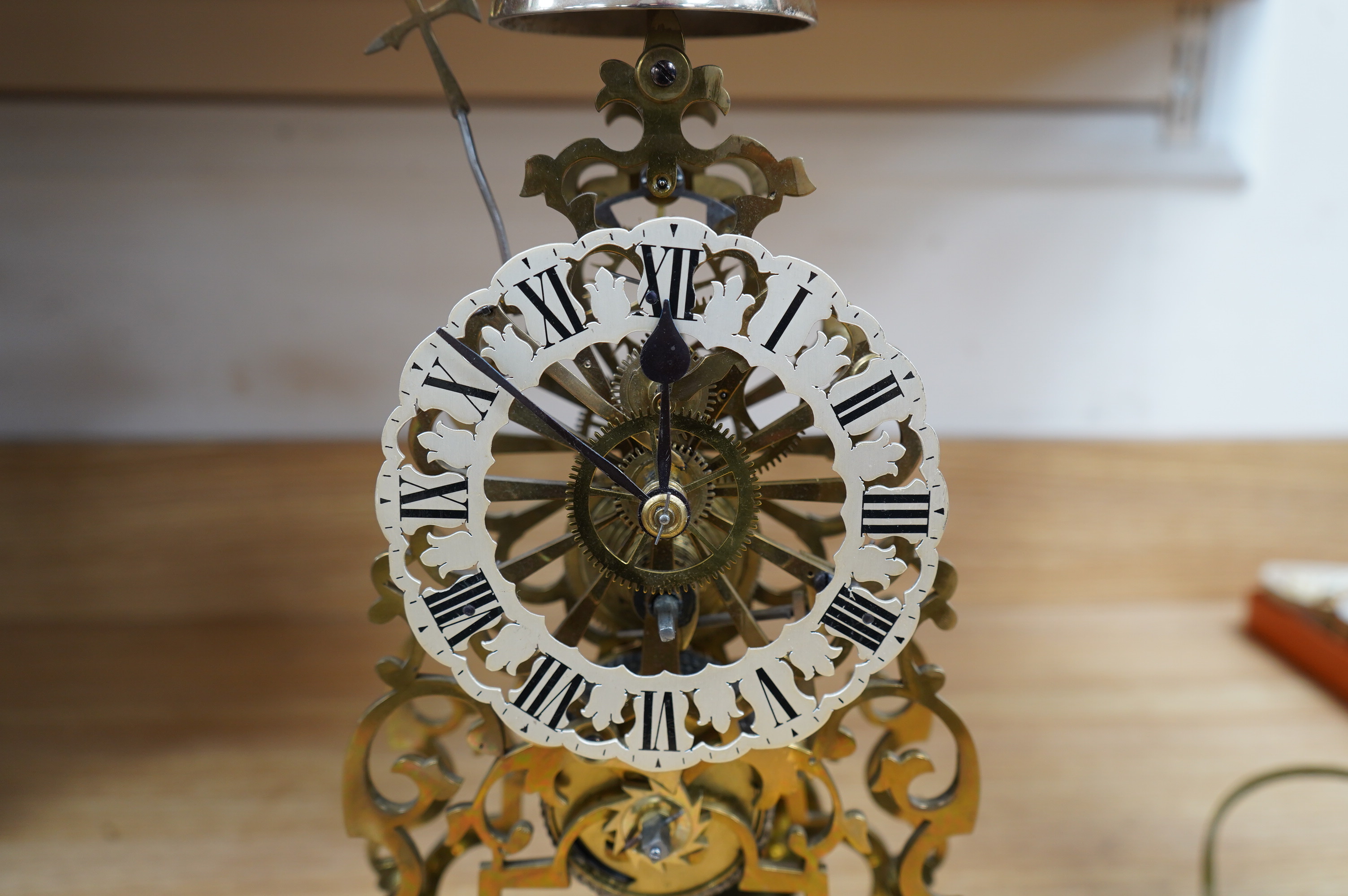 A Victorian brass single fusee passing strike skeleton clock, with pendulum, lacking dome and key, 39cm. Condition - good, not tested